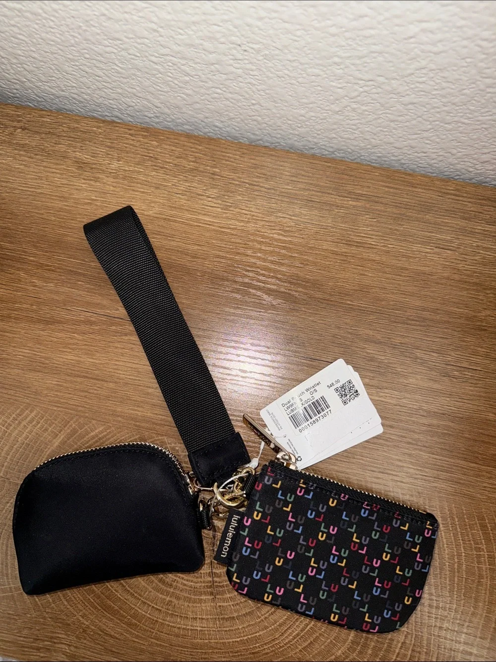 lululemon athletica Black Wristlet with Multicolor 'C' Print